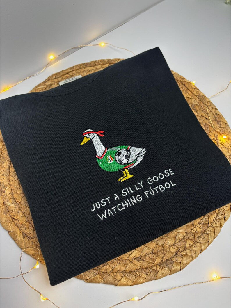Just A Silly Goose Watching Futbol Embroidered T-Shirt – Funny Soccer Goose Graphic Tee