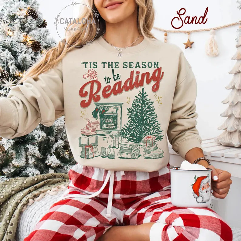 Original sand reading sweatshirt worn with plaid lounge pants