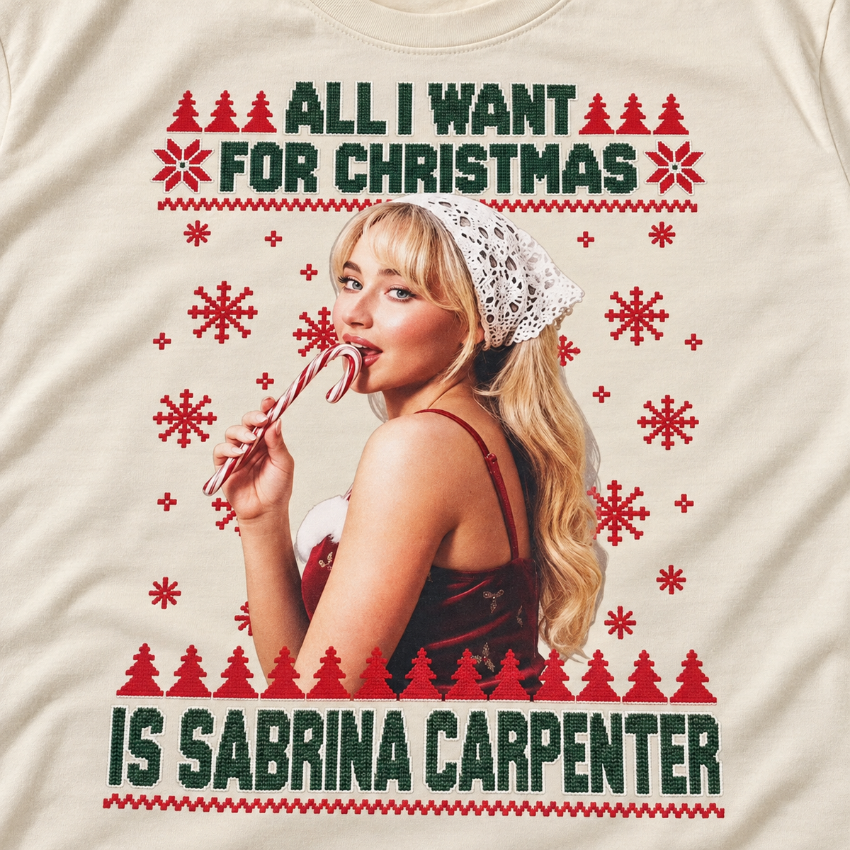 Close-up of the Sabrina Carpenter Christmas print on cream fabric