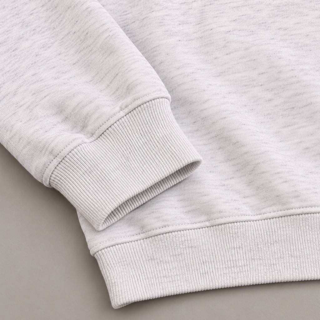 Ash-gray heather sweatshirt ribbed cuff and hem detail