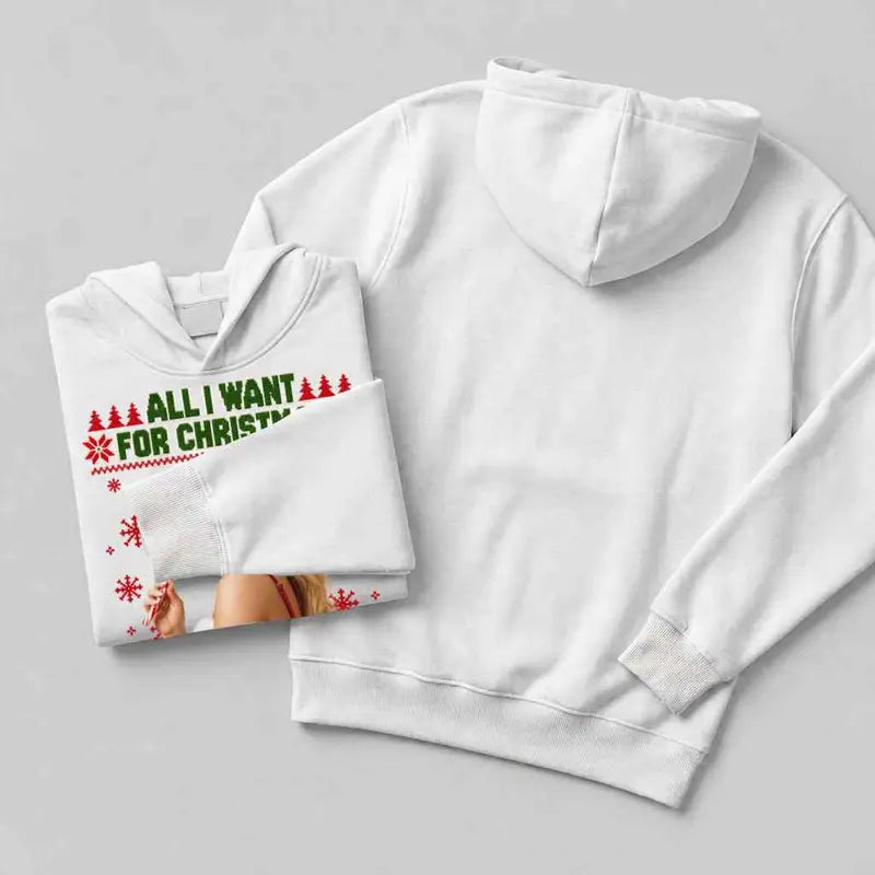 White hoodie style shown folded beside its plain back