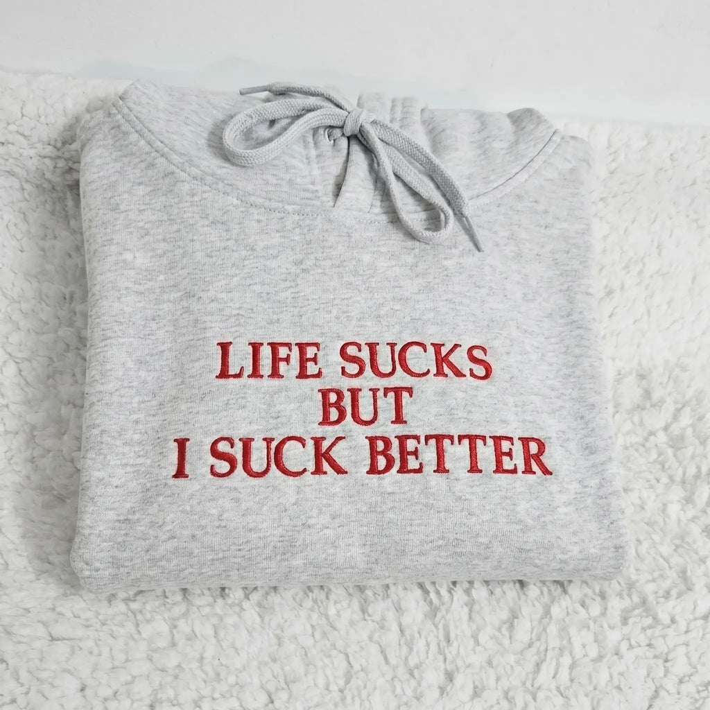 [EMBROIDERED] Funny Slogan Red “Life Sucks But I Suck Better” TShirt, Sweatshirt, Hoodie, Unisex Streetwear